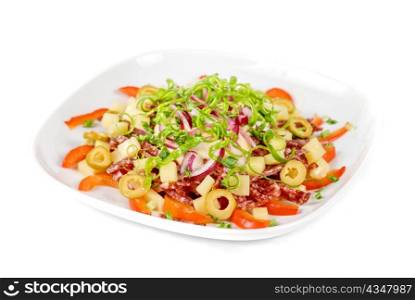 salad from salami, vegetables and olives