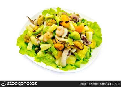 Salad from shrimps, octopus, mussels and calamari with avocado, green lettuce, pineapple in plate isolated on white background