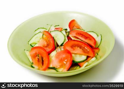 Salad from tomatoes and cucumbers
