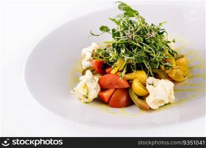 salad of different tomatoes on plate