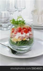 Salad of lettuce with egg, ham, tomatoes, dressed yogurt and cheese