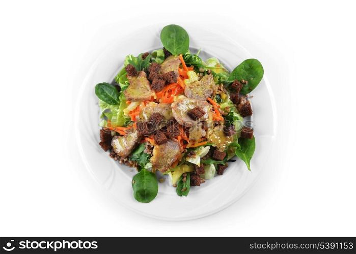 salad of marinated pork, spinach and buckwheat