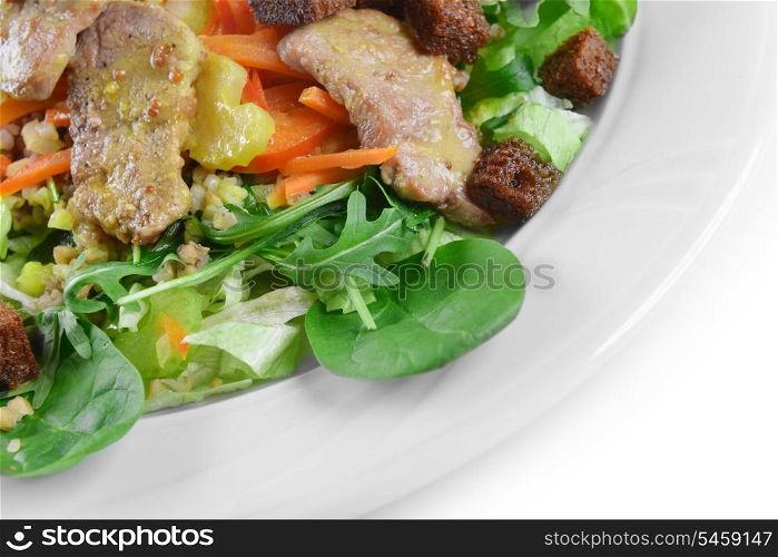 salad of marinated pork, spinach and buckwheat