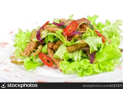 Salad of pork, courgette, lime with hazelnut and lettuce