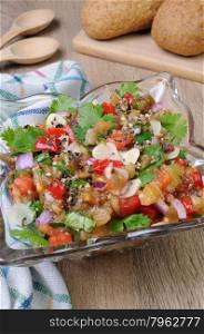 Salad of roasted eggplant with tomatoes, peppers, and cilantro