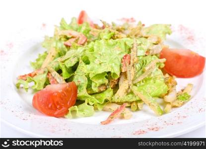 Salad of squid with roast chicken meat, apples, tomatoes, eggs and peppers