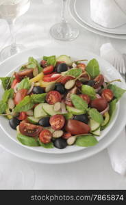 Salad of summer vegetables with basil and capers