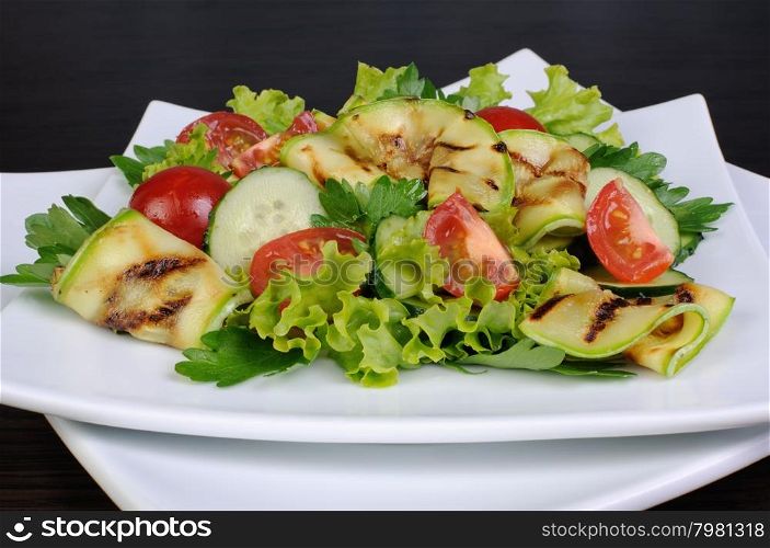 Salad of tomato, cucumber lettuce and zucchini