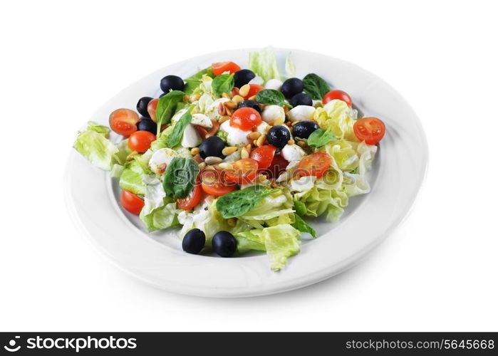 salad of vegetables with cheese and seeds on plate