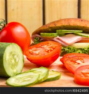 Salad Sandwich Roll Representing Tomato Pieces And Rolls