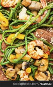 Salad with atlantic shrimps and asparagus beans.Healthy salad plate. Prawn with asparagus beans