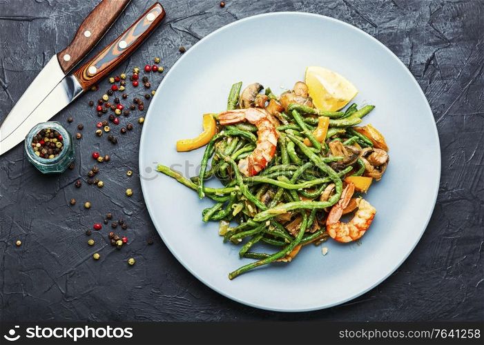 Salad with atlantic shrimps and asparagus beans.Stew with seafood and vegetables.. Summer salad with shrimp and vegetables