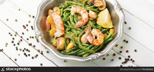 Salad with atlantic shrimps and asparagus beans.Stew with seafood and vegetables.. Shrimp with asparagus beans