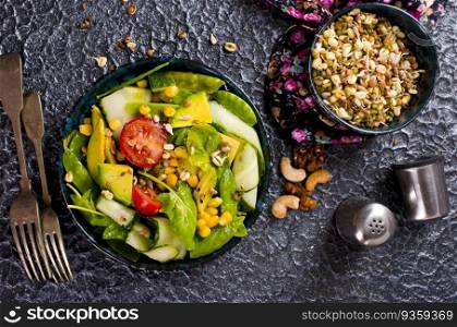 salad with avocado, nuts and sweet corn