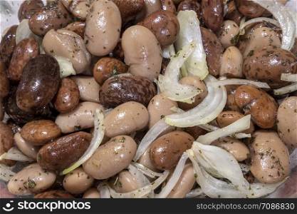 Salad with beans. Natural products. Salad with vegetables. Proper nutrition. Beans with onion close up