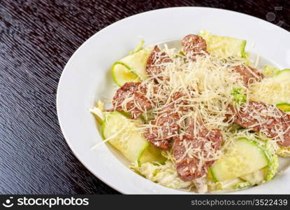 Salad with beef, lettuce, cucumber, string beans, Chinese cabbage and sauce