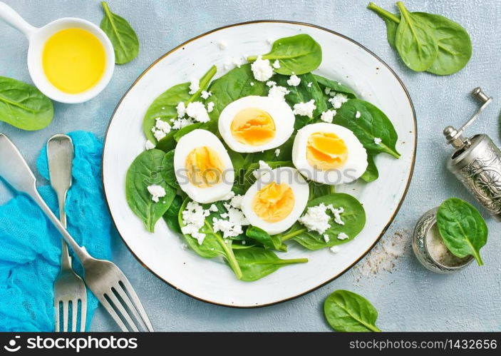 salad with boiled eggs on plate, stock photo