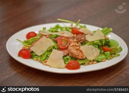 Salad with chicken and parmesan . chicken salad