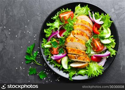 Salad with chicken meat. Fresh vegetable salad with chicken breast. Meat salad with chicken fillet and fresh vegetables on plate