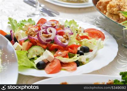 salad with feta cheese and fresh vegetables