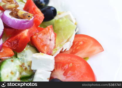 salad with feta cheese and fresh vegetables