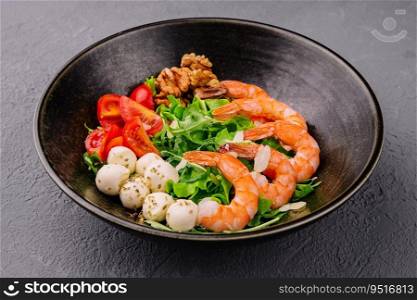 Salad with fresh arugula leaves, mozzarella cheese and shrimps