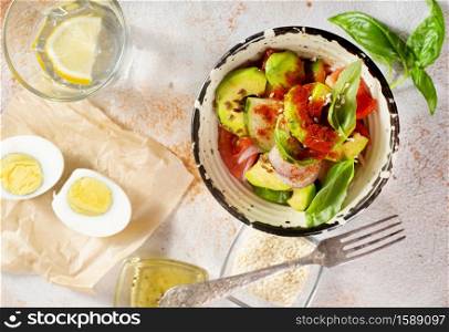 salad with fresh avocado egg salmon fish