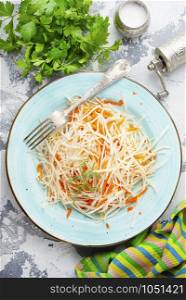 salad with fresh carrot and cabbage on plate