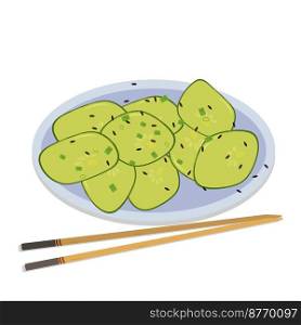 salad with fresh cucumber and black sesame in a round plate with bamboo sticks. salad with fresh cucumber and black sesame