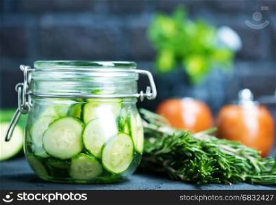 salad with fresh cucumber in glass bank