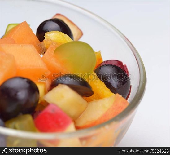 salad with fresh fruits and berries healthy food isolated on white backgound