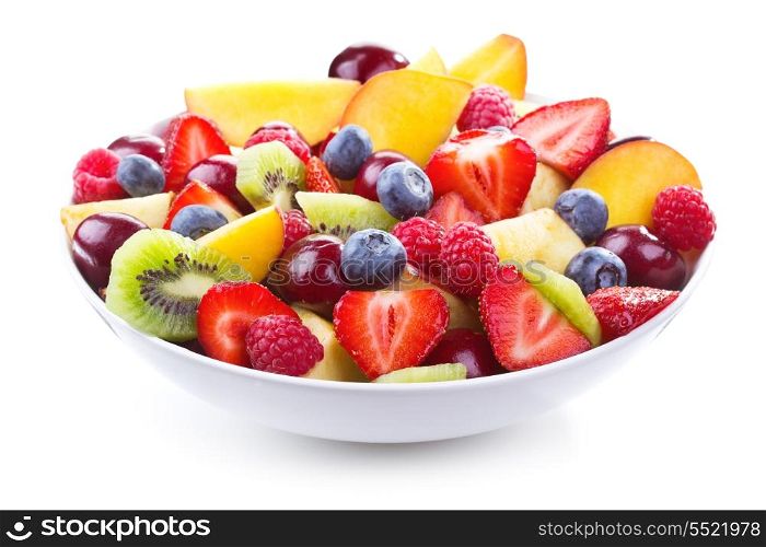 salad with fresh fruits and berries on wihite background