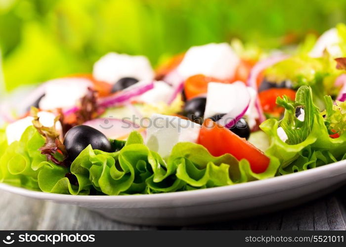 salad with fresh vegetables and feta cheese