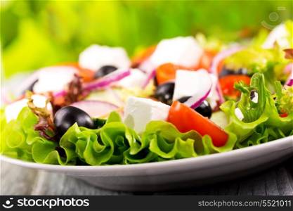 salad with fresh vegetables and feta cheese