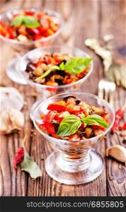 salad with grilled vegetables in the glass bowl