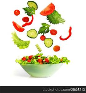 salad with lettuce and other fresh vegetable on white dish.