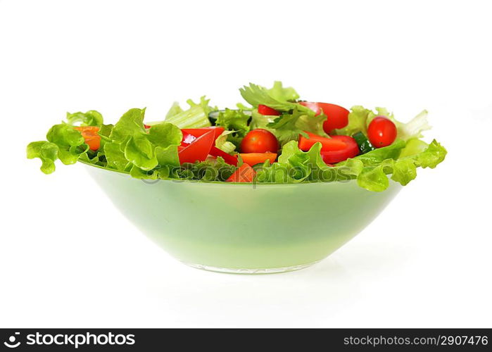 salad with lettuce and other fresh vegetable on white dish.