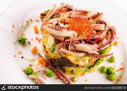 Salad with seafood, octopus and red caviar