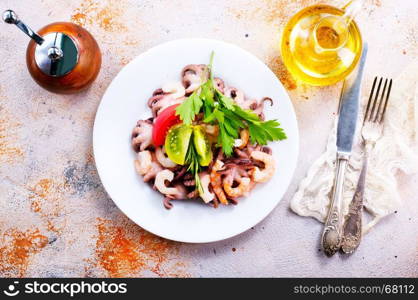 salad with seafood on the plate, stock photo