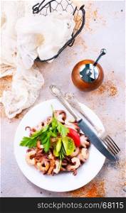 salad with seafood on the plate, stock photo
