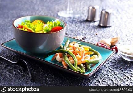 salad with shrimp and green beans on plate