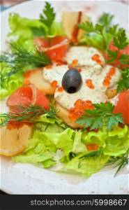 salad with smoked salmon . vegetable salad with smoked salmon