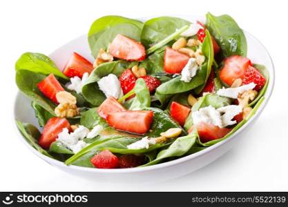 salad with strawberry, spinach leaves and feta cheese on white background