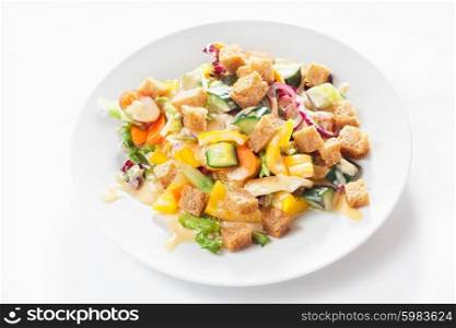 salad with vegetables and crusts on white background