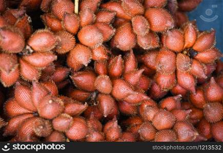 Salak Palm texture background or snake fruit for sale in the fruit market / Salacca zalacca