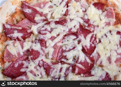 Salami pizza isolated on a white background