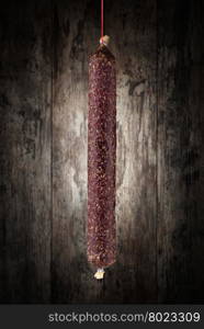 salami . salami on a wooden background