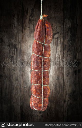 salami . salami on a wooden background