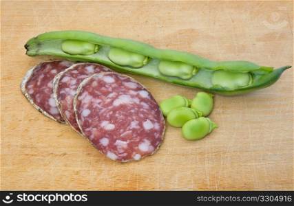 salami slices with fava beans