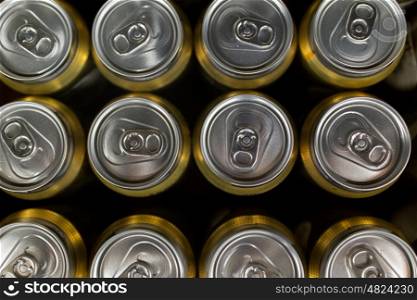 sale and alcohol concept - close up of cans with drinks from top. close up of cans with drinks